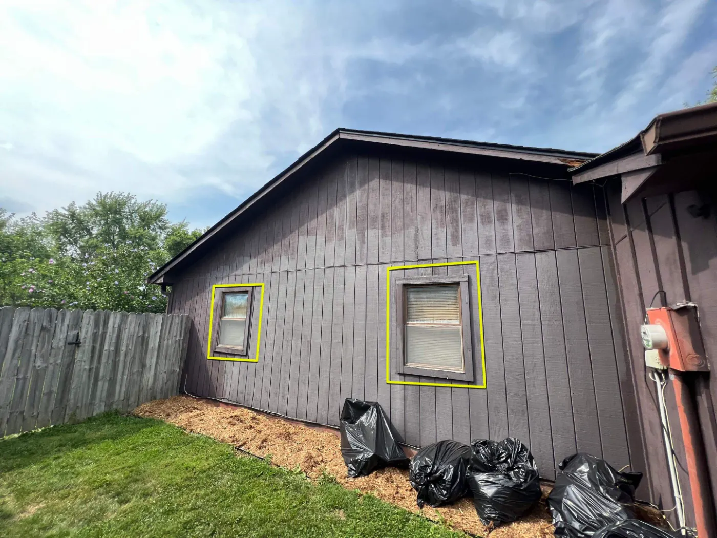 Storm-damaged window documented in Windfall
