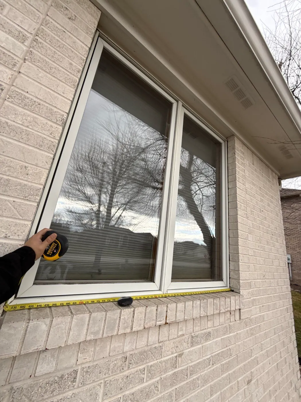 Window replacement documented in Windfall